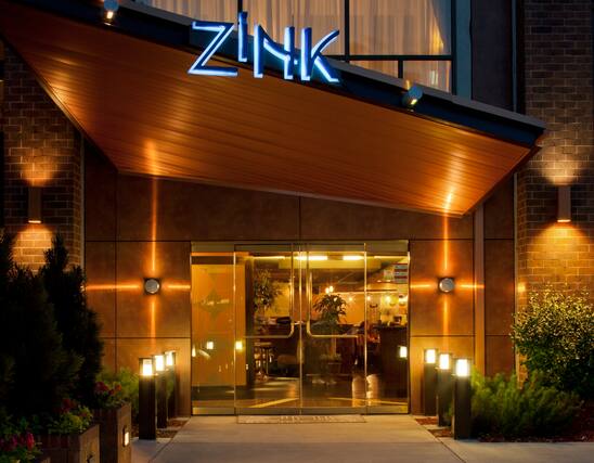 Doubletree Dtc Zink Kitchen And Bar Exterior Entrance Evening Lighting ?impolicy=crop&cw=3385&ch=2637&gravity=NorthWest&xposition=0&yposition=473&rw=548&rh=427