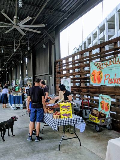 People shopping at the stalls of Ponce City Farmers Market in Atlanta
